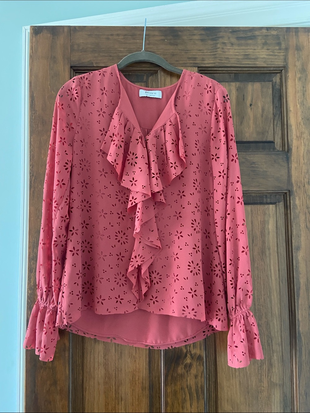 Bailey 44 Coral Eyelet Ruffle Front Blouse
(Size small)  Like New No Tags